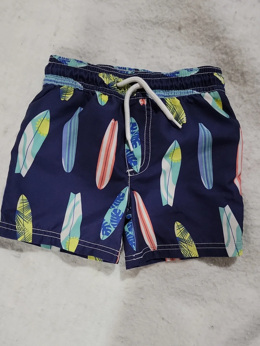 Carter's Navy Swim Trunks with Colorful Surfboard Print